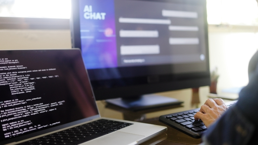 Developer coding an AI app with a chat interface during AI app development